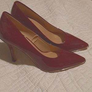 maroon with gold trim heels